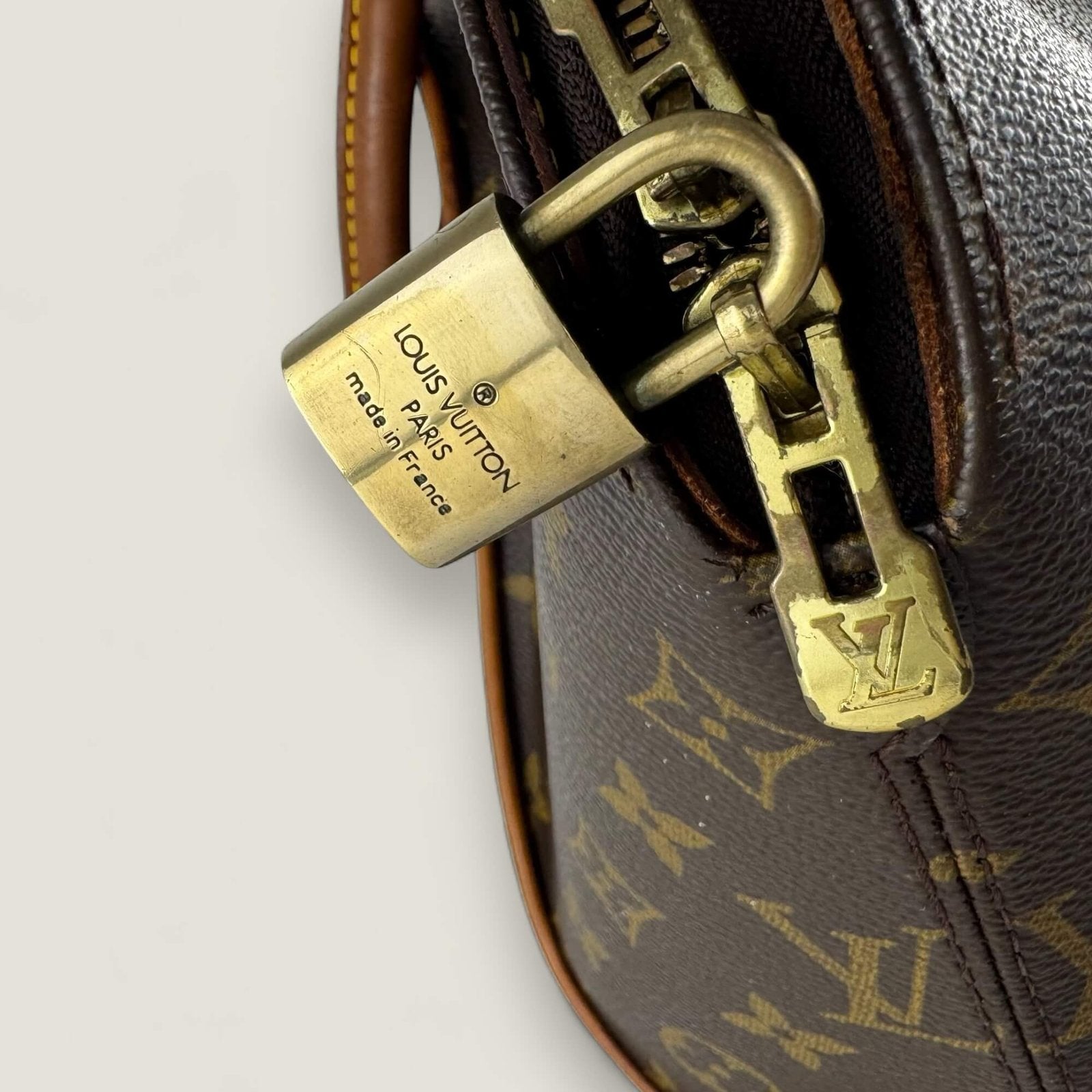 Vintage Louis Vuitton lock and zipper