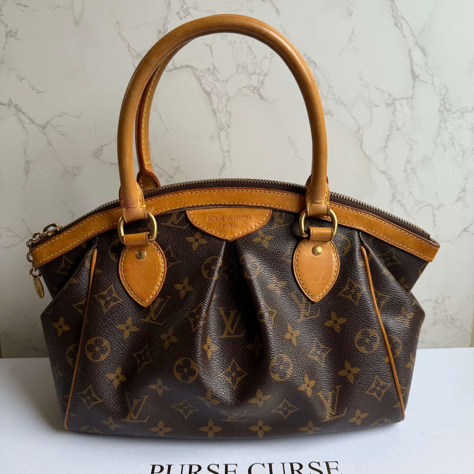 Front view of Louis Vuitton Tivoli PM Monogram bag