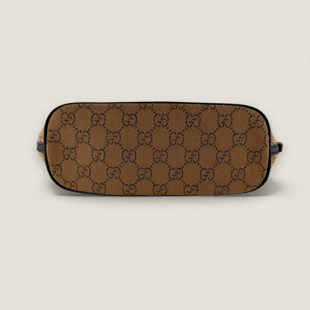 bottom Gucci GG supreme bag