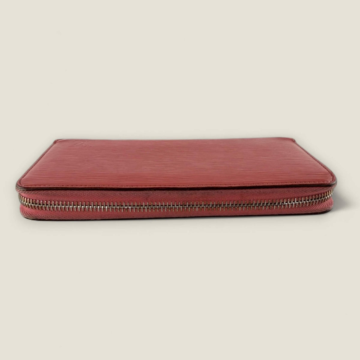 Bottom of original Louis Vuitton wallet in pink Epi leather