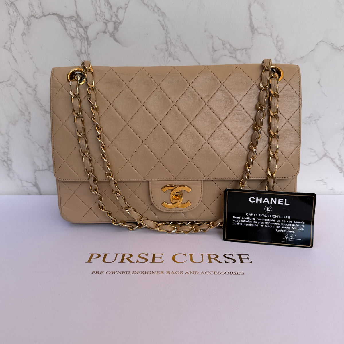 tweedehands Chanel flap bag medium beige authenticiteitskaart 