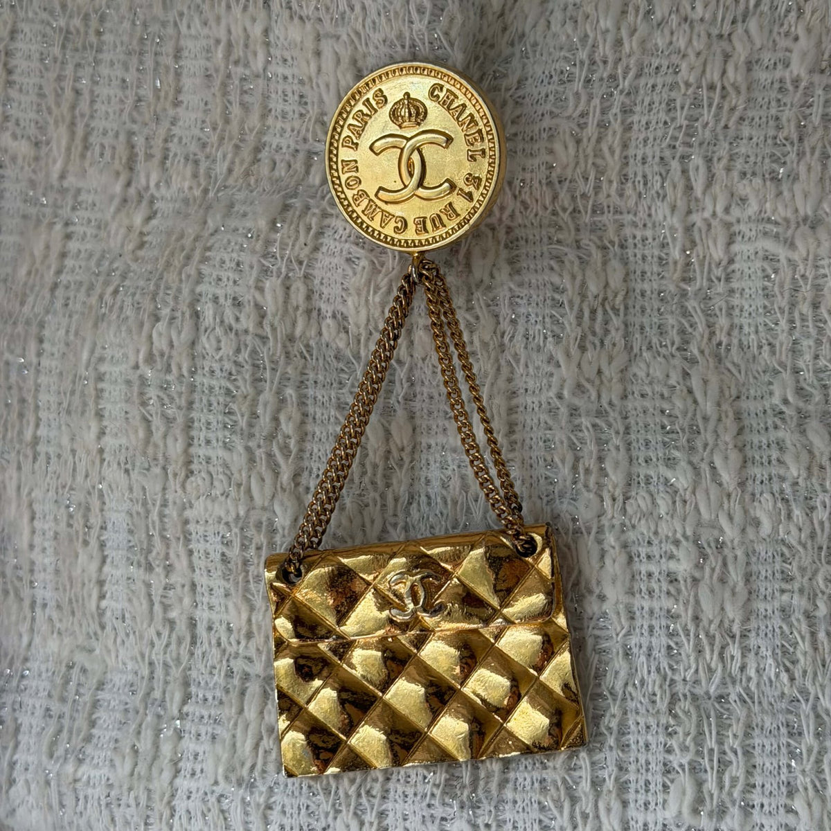 vintage Chanel brooch classic flap bag